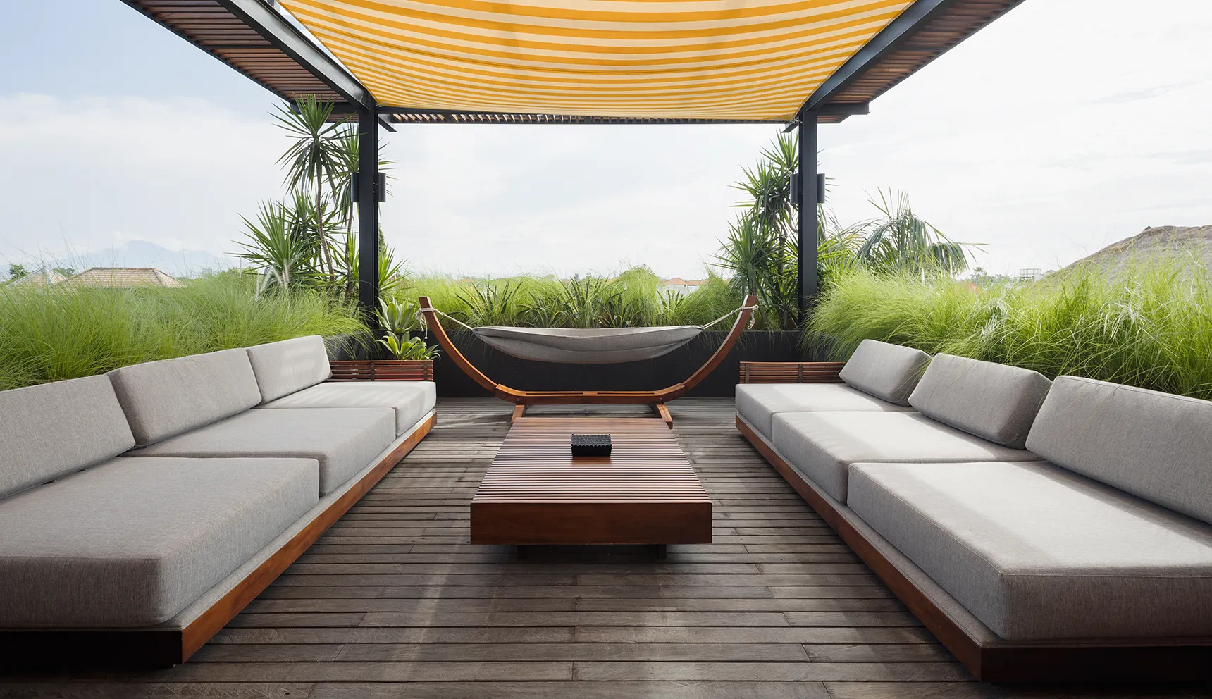 architecture with the surrounding tropical landscape.webp